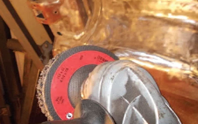 Flap disc preparation for underside rust treatment